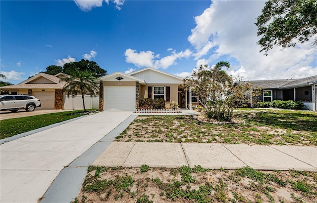 699 Merlins Ct, Tarpon Springs, FL 34689 - ranch-style home with an attached garage and driveway