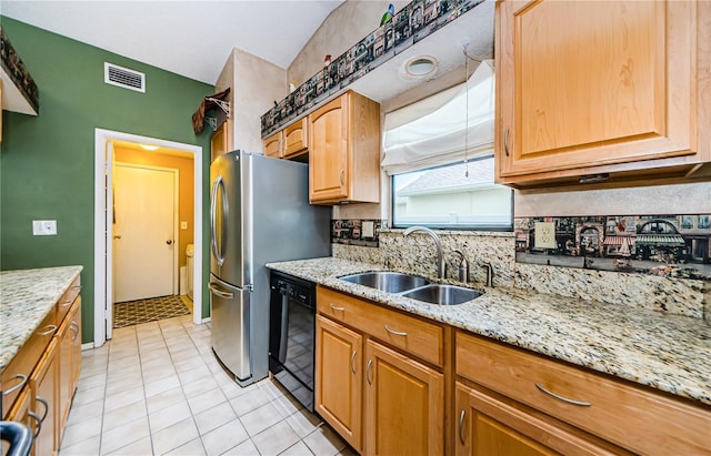 699 Merlins Ct, Tarpon Springs, FL 34689 - kitchen featuring black dishwasher, a sink, light stone counters, backsplash, and light tile patterned flooring