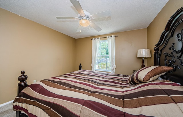 699 Merlins Ct, Tarpon Springs, FL 34689 - bedroom with a textured ceiling, ceiling fan, and carpet floors