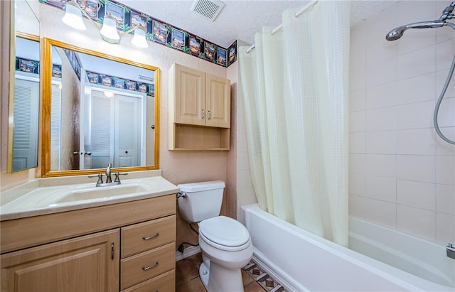 699 Merlins Ct, Tarpon Springs, FL 34689 - full bathroom with shower / tub combo, toilet, a textured ceiling, and vanity