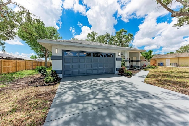 3330 46th Ter E, Bradenton, FL 34203 - single story home featuring fence, stucco siding, concrete driveway, and an attached garage
