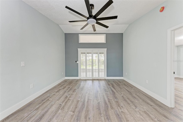 3330 46th Ter E, Bradenton, FL 34203 - empty room featuring a textured ceiling, light wood finished floors, ceiling fan, and baseboards