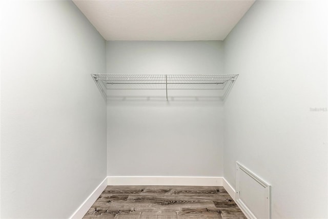 3330 46th Ter E, Bradenton, FL 34203 - walk in closet featuring wood finished floors
