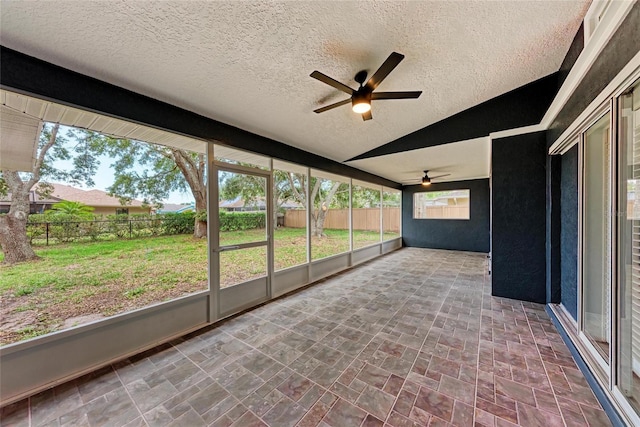 3330 46th Ter E, Bradenton, FL 34203 - unfurnished sunroom featuring a ceiling fan, lofted ceiling, and healthy amount of natural light