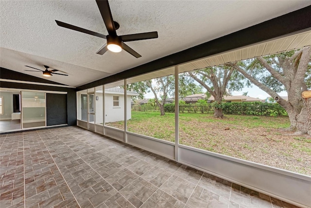 3330 46th Ter E, Bradenton, FL 34203 - unfurnished sunroom featuring a ceiling fan, vaulted ceiling, and healthy amount of natural light