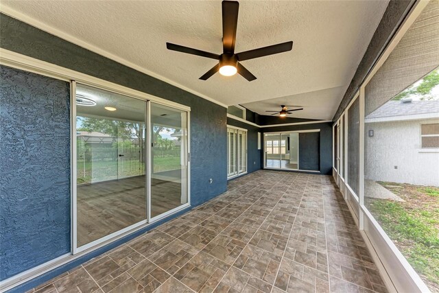 3330 46th Ter E, Bradenton, FL 34203 - unfurnished sunroom with a ceiling fan
