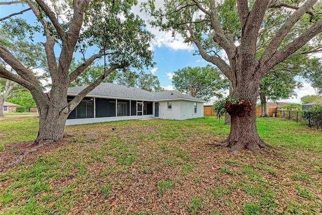 3330 46th Ter E, Bradenton, FL 34203 - back of house featuring a sunroom and a shingled roof