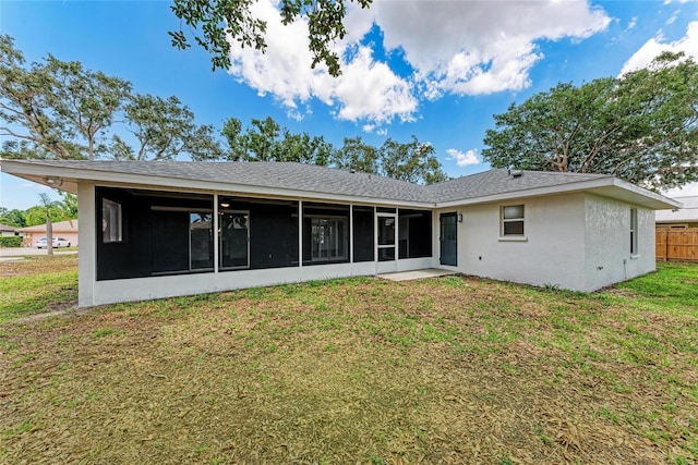 3330 46th Ter E, Bradenton, FL 34203 - rear view of property featuring a sunroom and stucco siding
