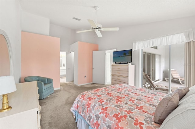 9188 Rhett Ln, Weeki Wachee, FL 34613 - bedroom with light carpet, high vaulted ceiling, baseboards, and a ceiling fan