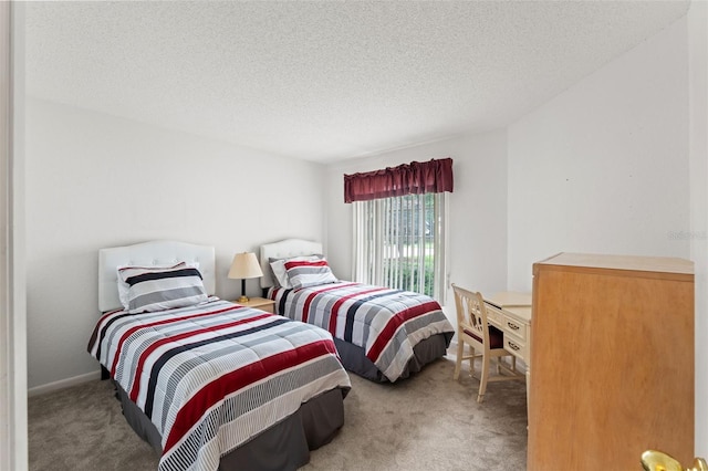 9188 Rhett Ln, Weeki Wachee, FL 34613 - carpeted bedroom featuring a textured ceiling