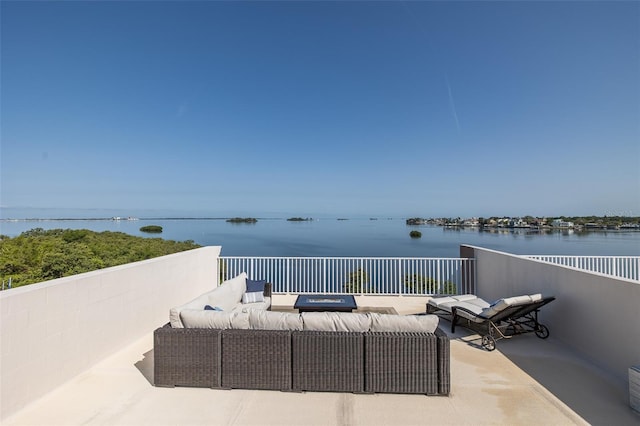 2750 Reserve Ct Unit 101, Dunedin, FL 34698 - view of patio with a water view, outdoor lounge area, and a balcony