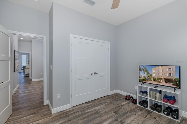 2750 Reserve Ct Unit 101, Dunedin, FL 34698 - playroom with wood finished floors, baseboards, and a ceiling fan