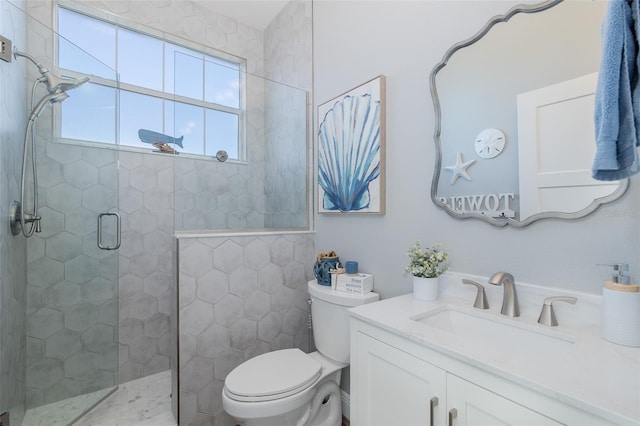 2750 Reserve Ct Unit 101, Dunedin, FL 34698 - bathroom featuring tiled shower, toilet, and vanity