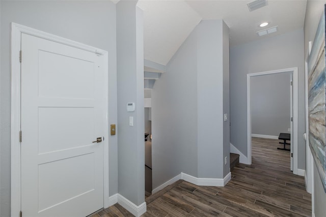 2750 Reserve Ct Unit 101, Dunedin, FL 34698 - hall with dark wood finished floors, baseboards, and recessed lighting
