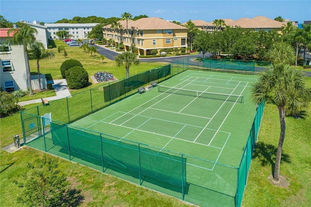 2750 Reserve Ct Unit 101, Dunedin, FL 34698 - view of tennis court featuring fence