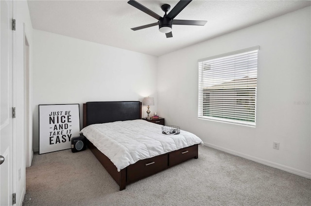 32965 Kaloko Rd, Wesley Chapel, FL 33543 - carpeted bedroom with baseboards and a ceiling fan