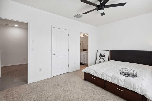 32965 Kaloko Rd, Wesley Chapel, FL 33543 - bedroom featuring ensuite bathroom, baseboards, light carpet, and ceiling fan