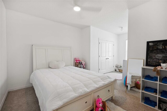32965 Kaloko Rd, Wesley Chapel, FL 33543 - bedroom featuring carpet, baseboards, a closet, and ceiling fan