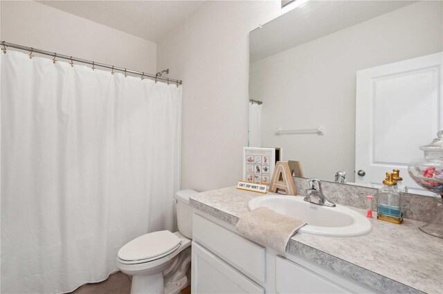 32965 Kaloko Rd, Wesley Chapel, FL 33543 - bathroom featuring toilet and vanity