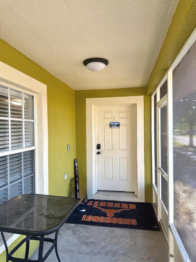10411 Summerview Cir, Riverview, FL 33578 - view of exterior entry featuring stucco siding