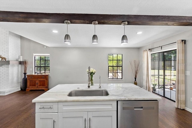 11207 Donneymoor Dr, Riverview, FL 33569 - kitchen featuring dishwasher, a sink, dark wood-style flooring, white cabinets, and beamed ceiling