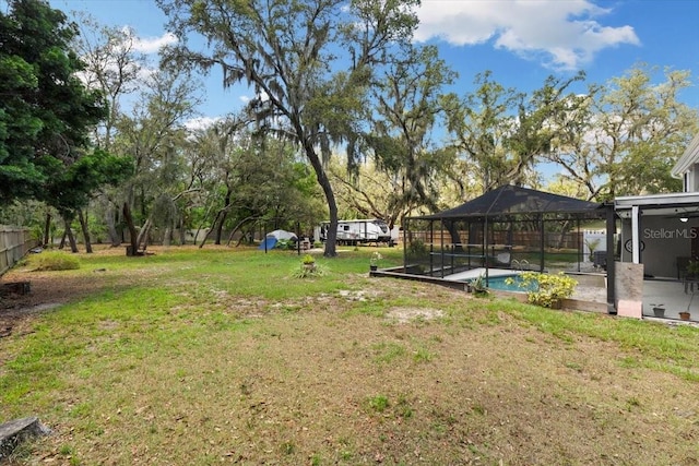 11207 Donneymoor Dr, Riverview, FL 33569 - view of green lawn with a lanai and a patio area