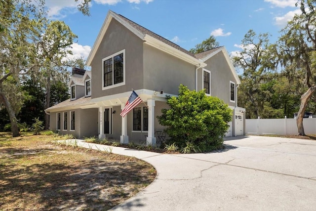 11207 Donneymoor Dr, Riverview, FL 33569 - view of front facade featuring driveway, stucco siding, and a garage