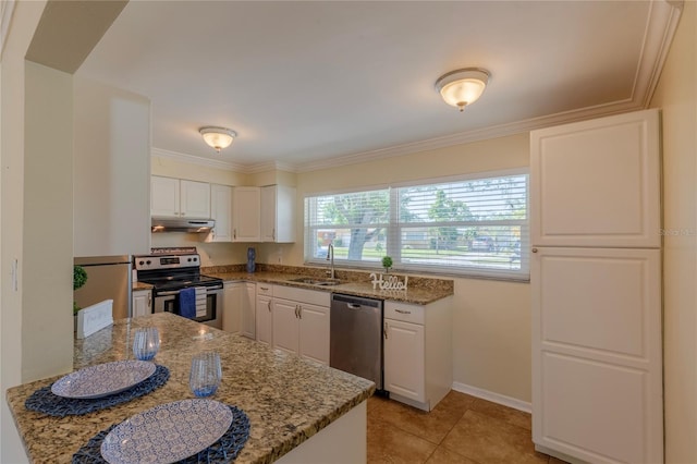 1400 63rd Ave S, Saint Petersburg, FL 33705 - kitchen featuring appliances with stainless steel finishes, a sink, light stone counters, white cabinets, and ornamental molding