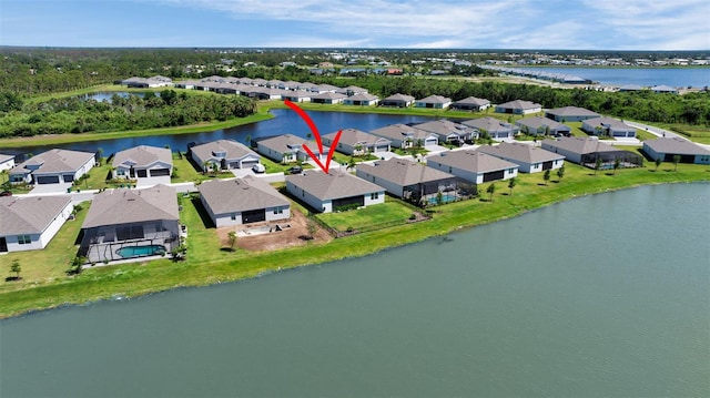8589 Saint Kitts Cir, Englewood, FL 34224 - aerial perspective of suburban area featuring a large body of water