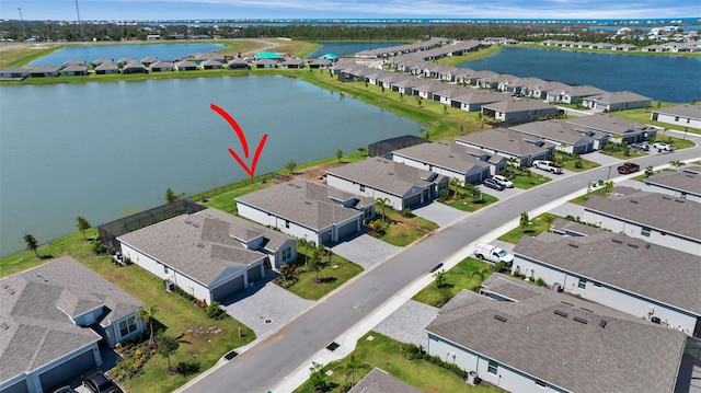 8589 Saint Kitts Cir, Englewood, FL 34224 - aerial view of residential area featuring a large body of water