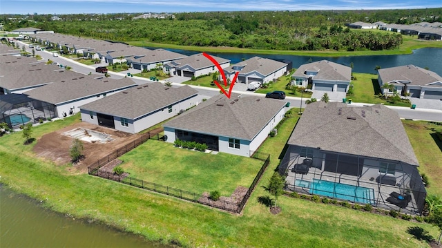 8589 Saint Kitts Cir, Englewood, FL 34224 - aerial view of residential area featuring a nearby body of water and a pool area
