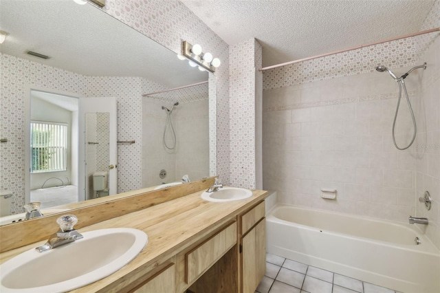 7035 Drury St, Tampa, FL 33635 - bathroom featuring a textured ceiling, shower / tub combination, tile patterned floors, double vanity, and wallpapered walls
