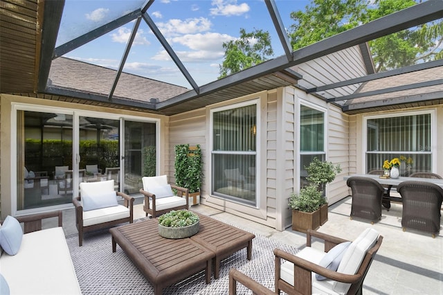7035 Drury St, Tampa, FL 33635 - view of patio with an outdoor hangout area, glass enclosure, and outdoor dining space
