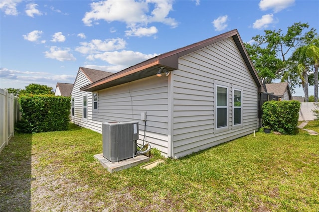 7035 Drury St, Tampa, FL 33635 - view of side of home featuring cooling unit