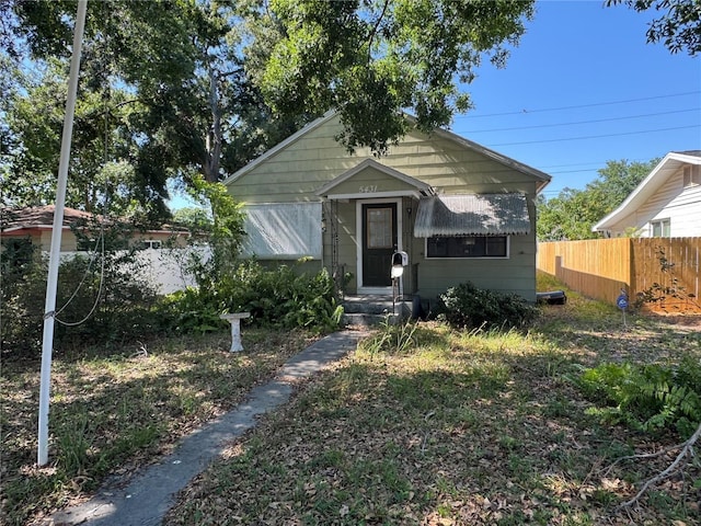 5431 Dartmouth Ave N, Saint Petersburg, FL 33710 - view of front of home with fence