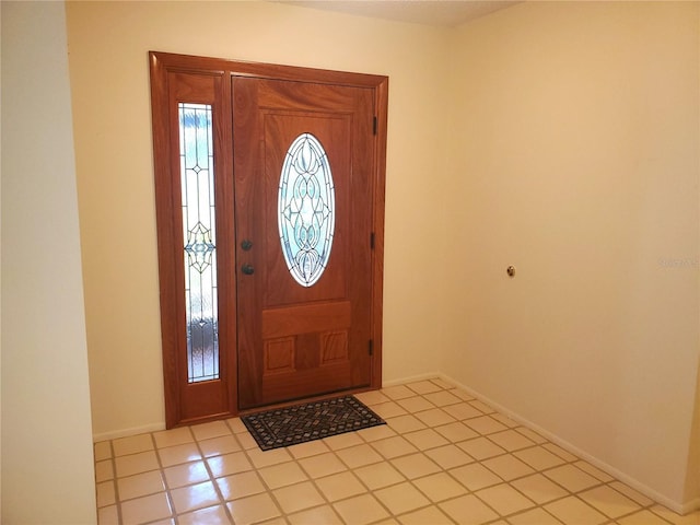 50 Water Oak Way, Oldsmar, FL 34677 - foyer with baseboards and tile patterned floors