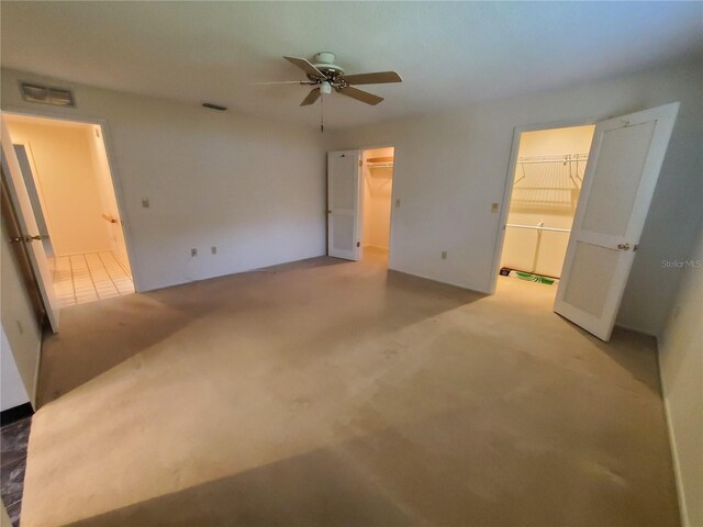 50 Water Oak Way, Oldsmar, FL 34677 - carpeted empty room featuring a ceiling fan