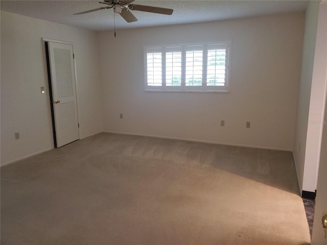 50 Water Oak Way, Oldsmar, FL 34677 - carpeted spare room featuring ceiling fan and baseboards