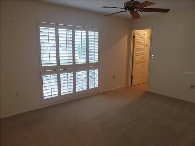 50 Water Oak Way, Oldsmar, FL 34677 - carpeted spare room featuring a ceiling fan and baseboards