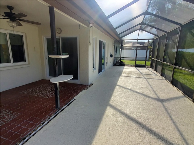 50 Water Oak Way, Oldsmar, FL 34677 - unfurnished sunroom with ceiling fan and vaulted ceiling