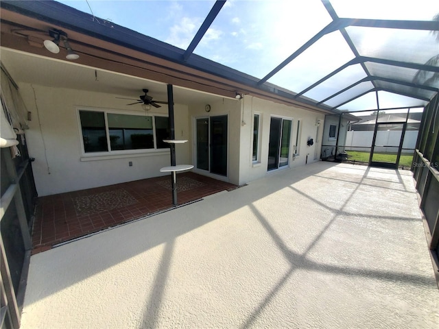 50 Water Oak Way, Oldsmar, FL 34677 - unfurnished sunroom with ceiling fan