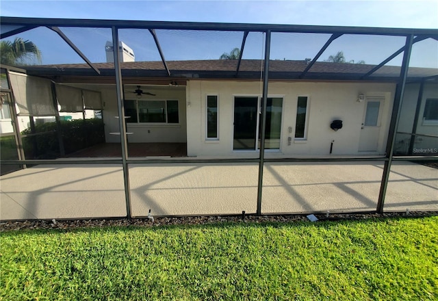 50 Water Oak Way, Oldsmar, FL 34677 - back of house featuring a ceiling fan, a patio, and a lanai