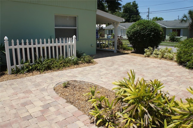 view of patio with fence