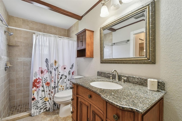 bathroom featuring toilet, a stall shower, a textured wall, vanity, and tile patterned floors