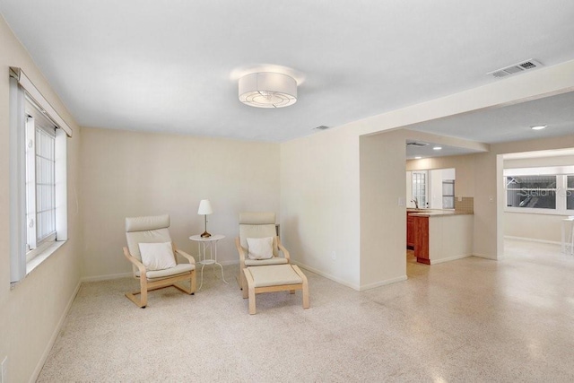 3247 Kimberly Oaks Dr, Holiday, FL 34691 - sitting room with baseboards