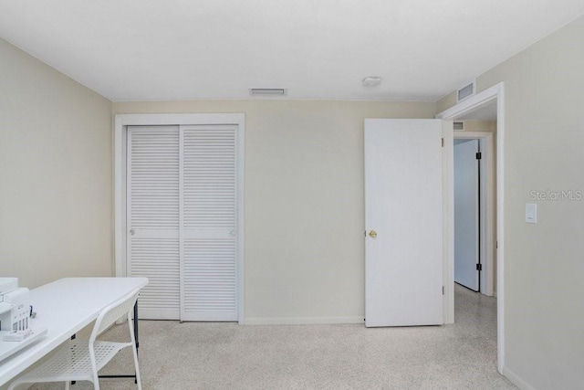 3247 Kimberly Oaks Dr, Holiday, FL 34691 - home office featuring baseboards