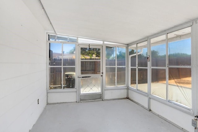 3247 Kimberly Oaks Dr, Holiday, FL 34691 - unfurnished sunroom featuring plenty of natural light