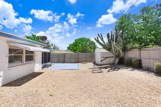 3247 Kimberly Oaks Dr, Holiday, FL 34691 - fenced backyard with a patio area