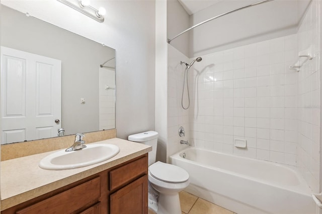 full bath featuring toilet, vanity, tub / shower combination, and tile patterned floors