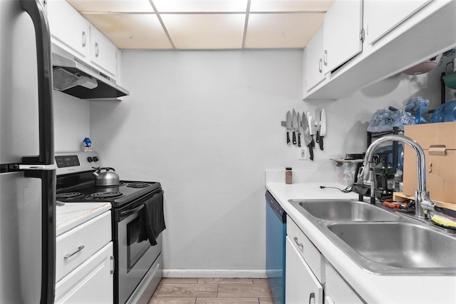 1799 N Highland Ave Unit 180, Clearwater, FL 33755 - kitchen with appliances with stainless steel finishes, a sink, under cabinet range hood, and light countertops